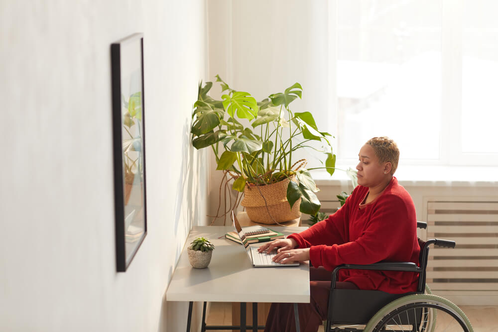 a business woman with disability working from home