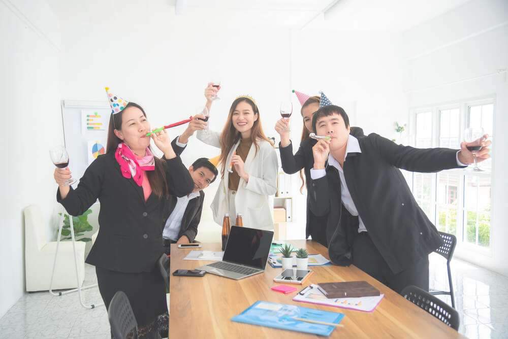 employees celebrating at the workplace